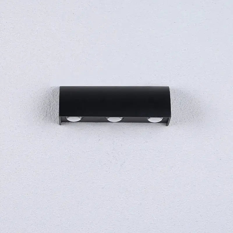 Modern black cylindrical led wall lamp with three recessed lights designed for bedroom waterproof lighting fixture