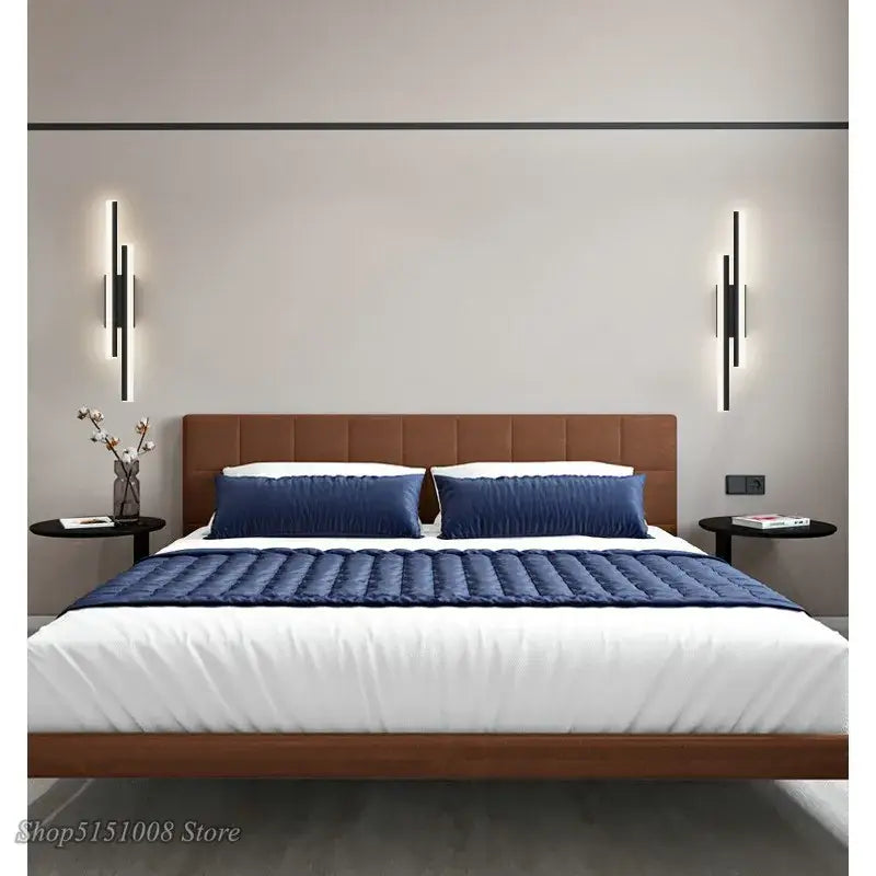 Modern black led wall lamp with dual light bars mounted above a brown tufted headboard for stylish living room decorbites led wall lamp