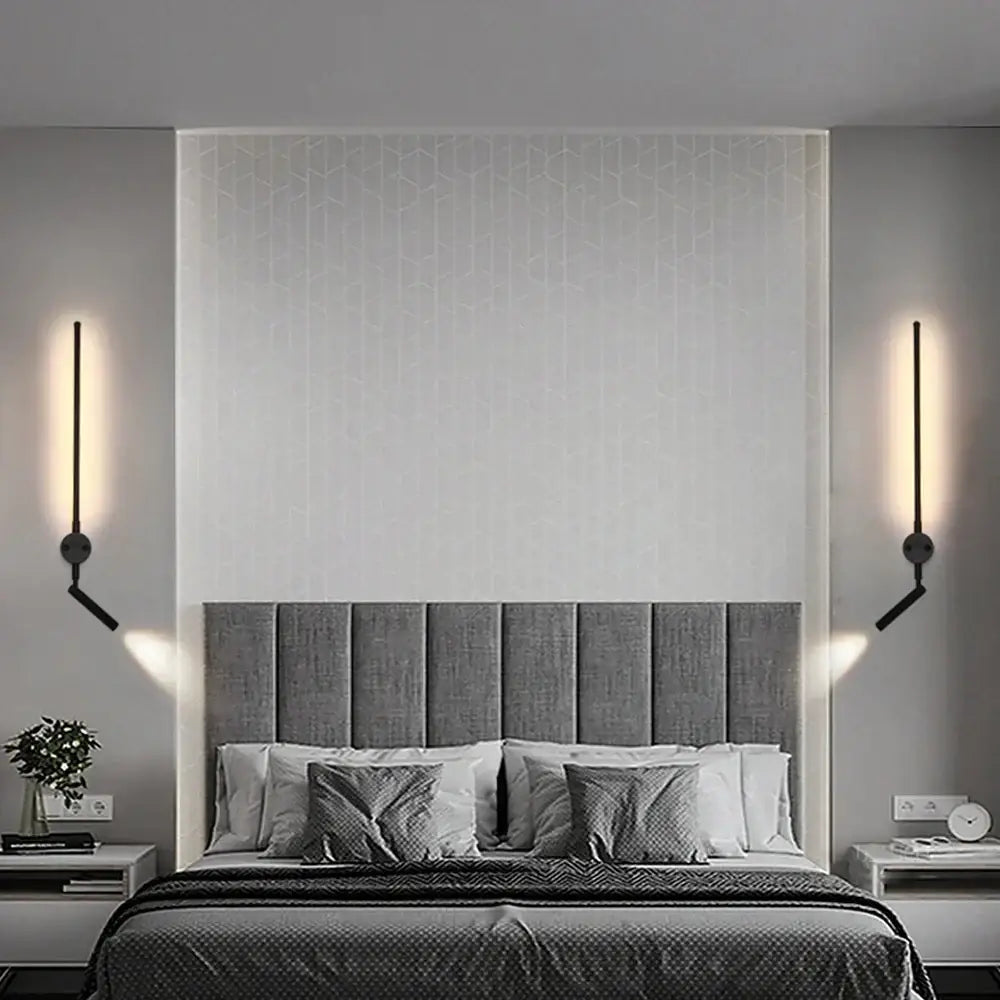 Modern black led wall lamp featuring minimalist vertical arms and circular bases for adjustable bedroom spotlight use