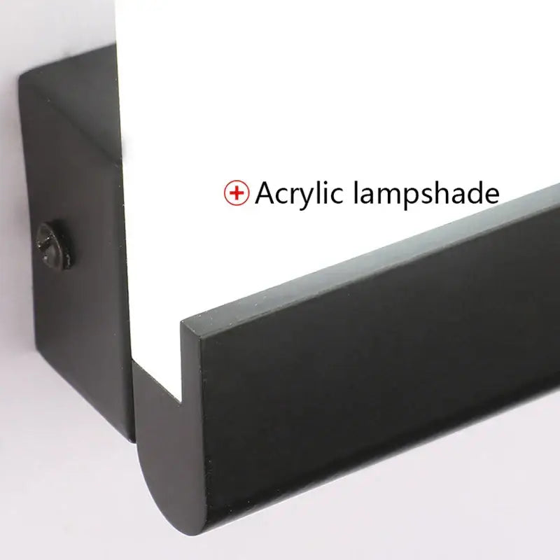 Modern black led wall lamp with a sleek black acrylic lampshade and matte finish for bedroom or living room use