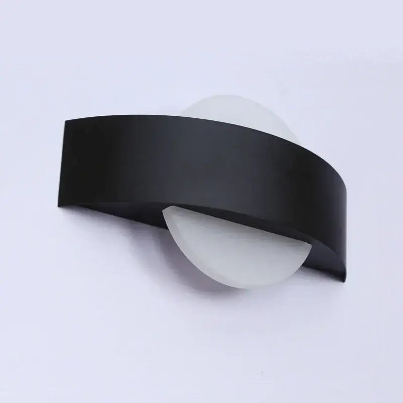 Modern black led wall lamp with frosted glass diffuser and curved design for bedroom lighting use
