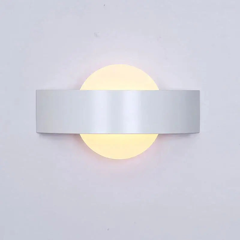 Modern black led wall lamp with frosted glass and a sleek silver metallic bar LED wall sconce for bedroom lighting