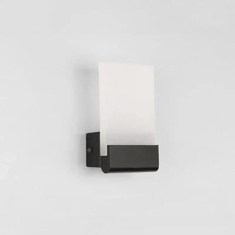 Modern black led wall lamp with frosted glass rectangular diffuser designed as a wall lamp for bedroom use