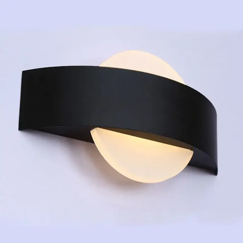 Modern black led wall lamp with frosted glass featuring a sleek curved design and warm diffused lighting for bedroom