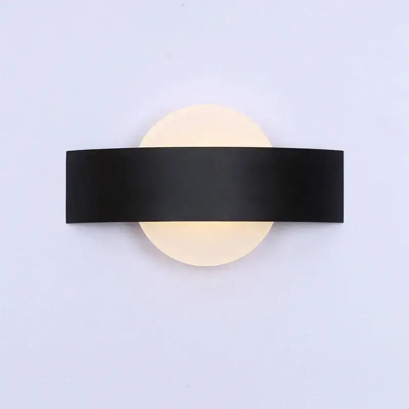 Modern black led wall lamp with a sleek rectangular bar and frosted glass diffuser for bedroom lighting