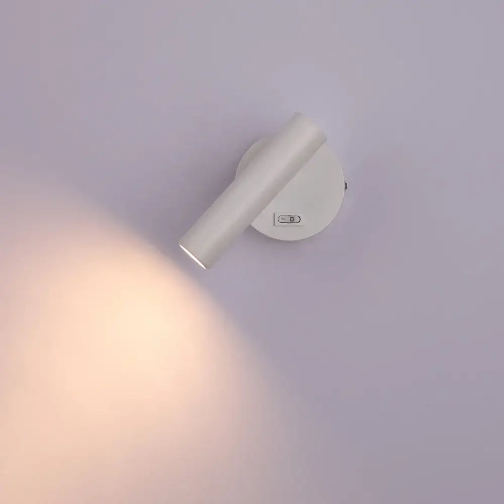 Modern black led wall lamp with white cylindrical adjustable head and sleek minimalist design for bedroom reading light
