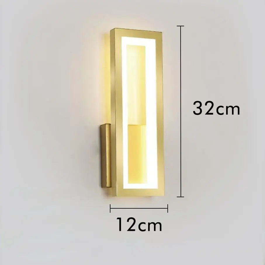 Gold-finished modern rectangular led wall sconce providing warm ambient lighting for bedroom decorbites led wall decor