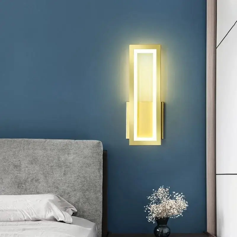 Modern black led wall sconce with gold-framed rectangular design and illuminated decorbites led wall light strip for bedroom