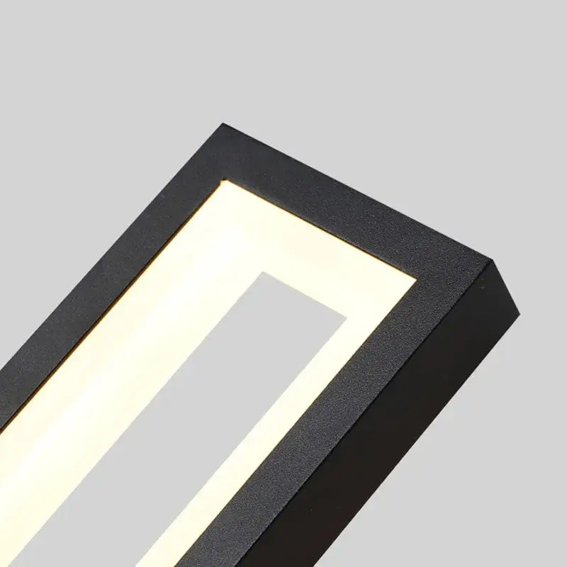 Modern black led wall sconce with sleek design and warm white light emitting from inner frame for bedroom decorbites led wall