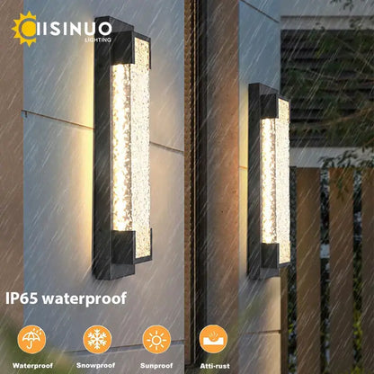 Modern black led wall sconce with textured amber glass panel diffusing warm light by decorbites dimmable led