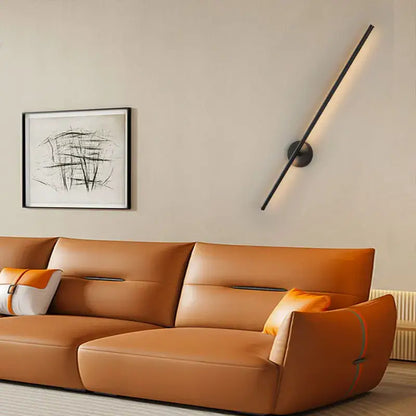 Modern black led wall sconce with sleek angled design and dimmable touch switch for bedroom lighting