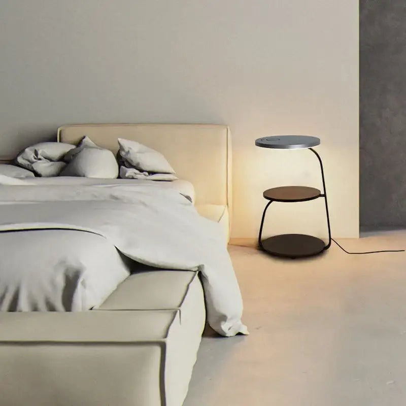 Minimalist tiered side table with black metal frame and matte gray led wood shelf for modern black led wood floor lamp decorbites