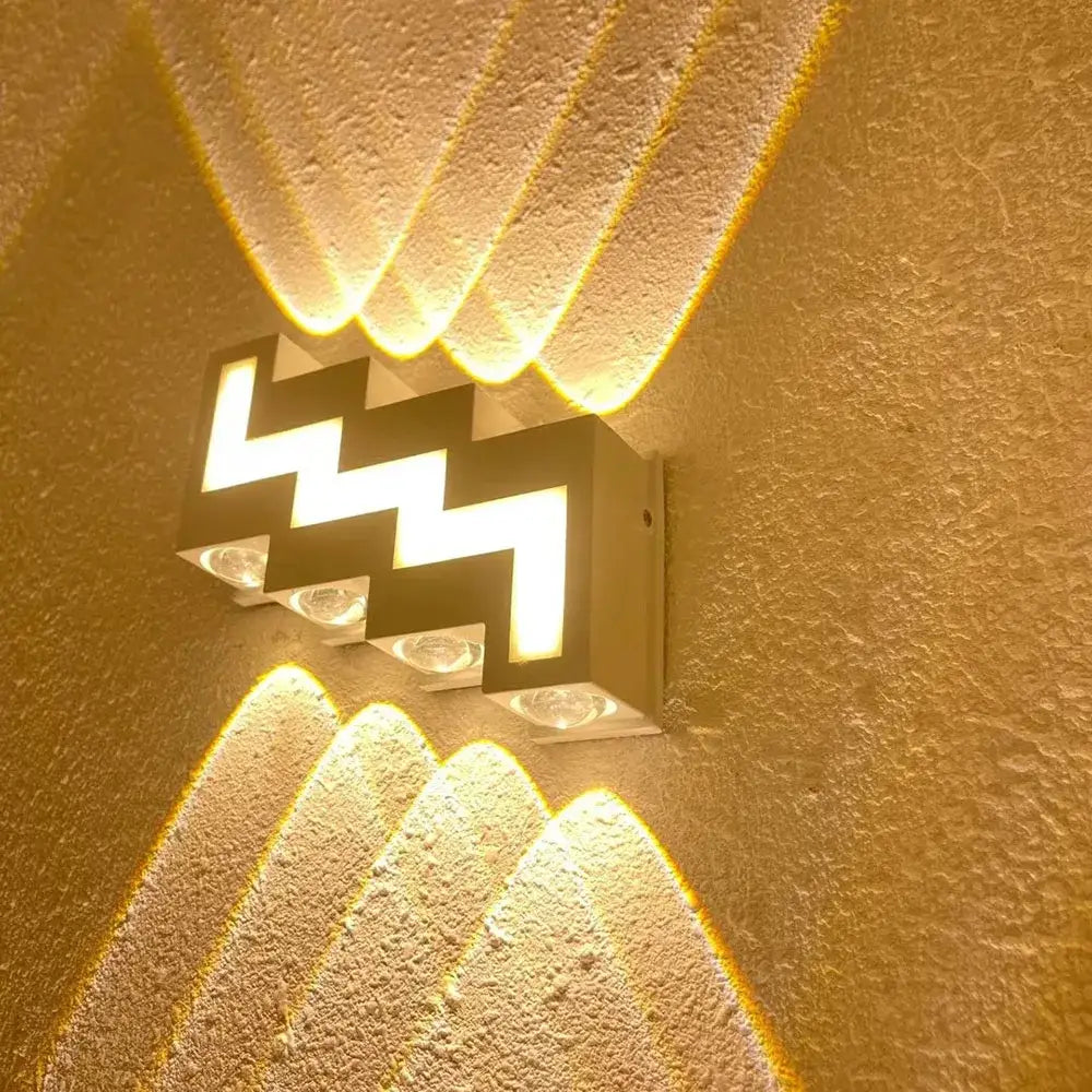 Modern geometric matte gold wall lamp with four led lights in zigzag pattern for decorbites ip65 led wall use