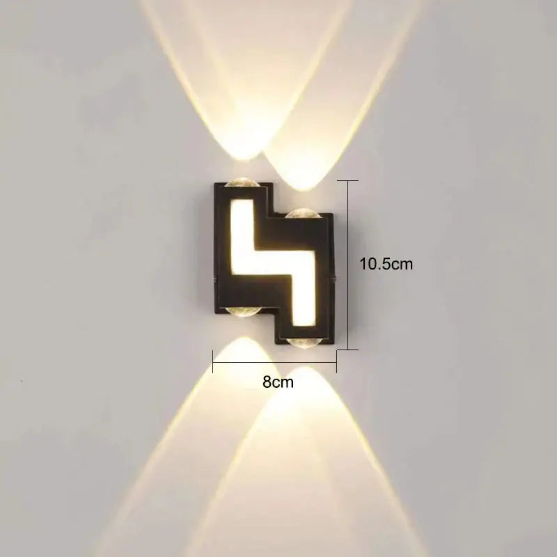 Modern black rectangular ip65 led wall lamp with geometric design and angled warm white beams for garden decorbites ip65 led