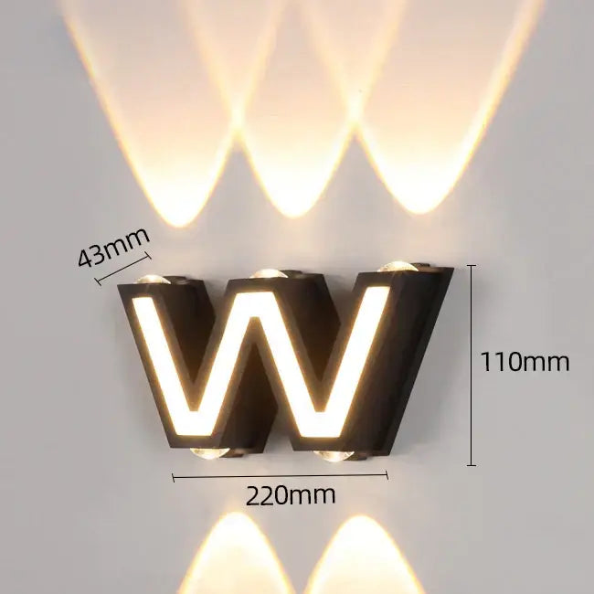 Modern black letter led wall lamp shaped like a glowing w with three light beams ip65 led wall for garden decorbites ip65 led