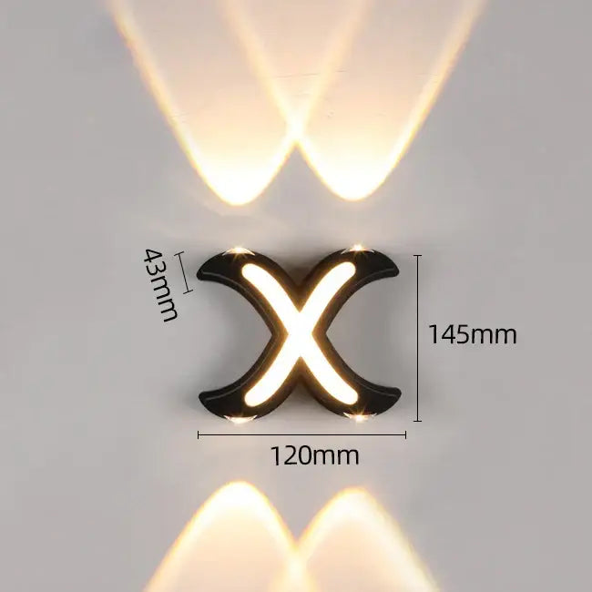 Modern black x-shaped wall lamp with decorbites ip65 led lights casting a warm glow for outdoor use