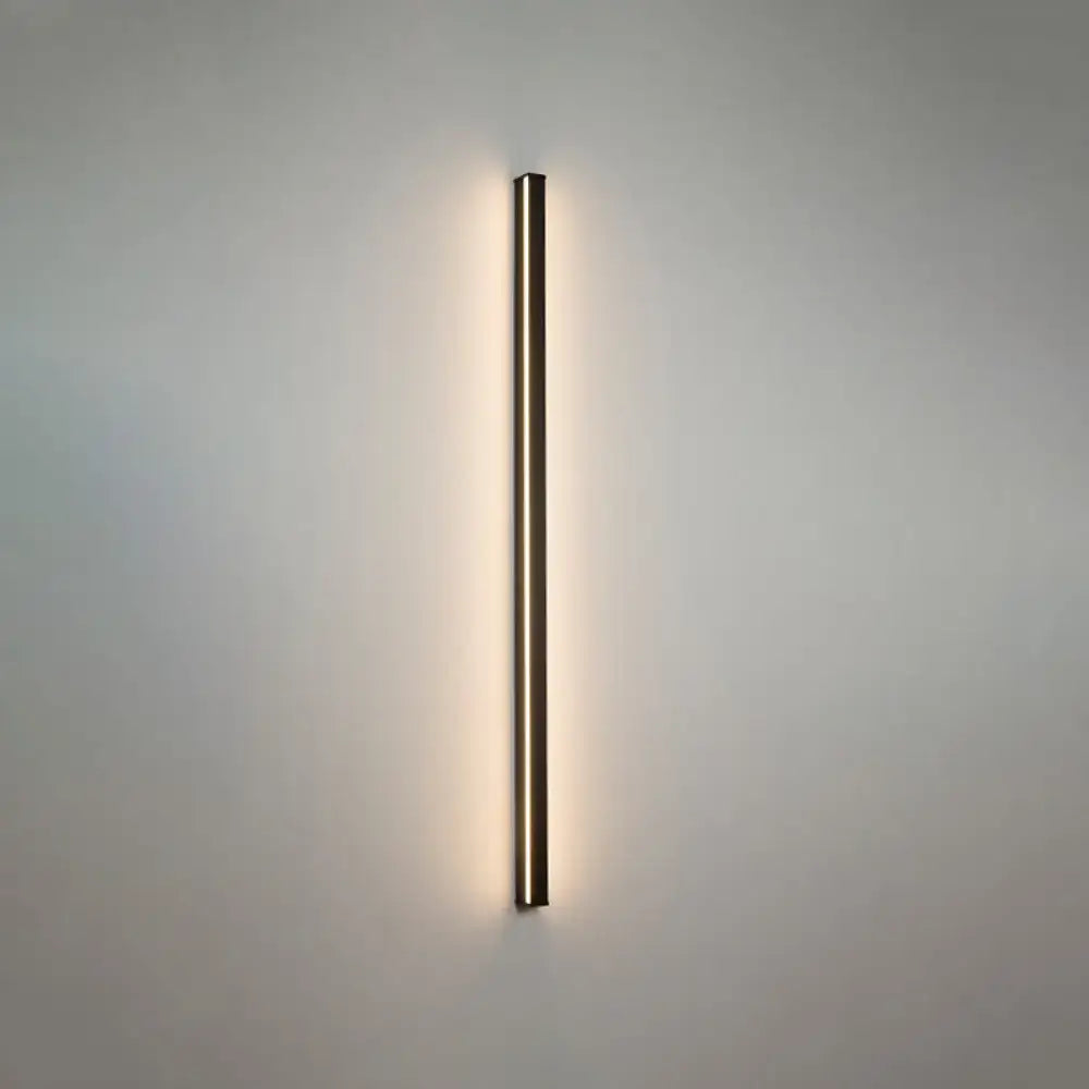 Minimalist gold-toned linear flush mount wall sconce with sleek modern design for hallway lighting