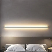 Modern black linear led wall sconce emitting warm glow compatible with decorbites led wall lights dimming for bedrooms