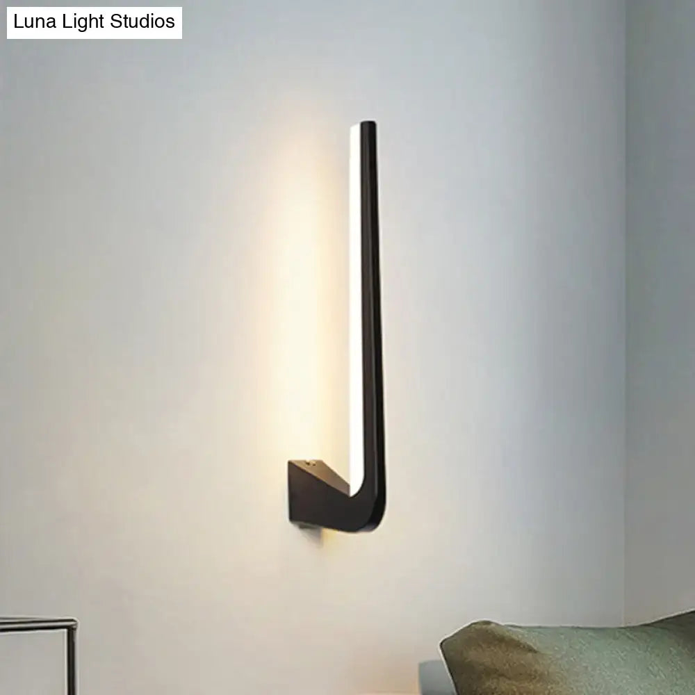 Modern black linear led wall sconce with sleek minimalist design and warm light for living room direct wired electric use