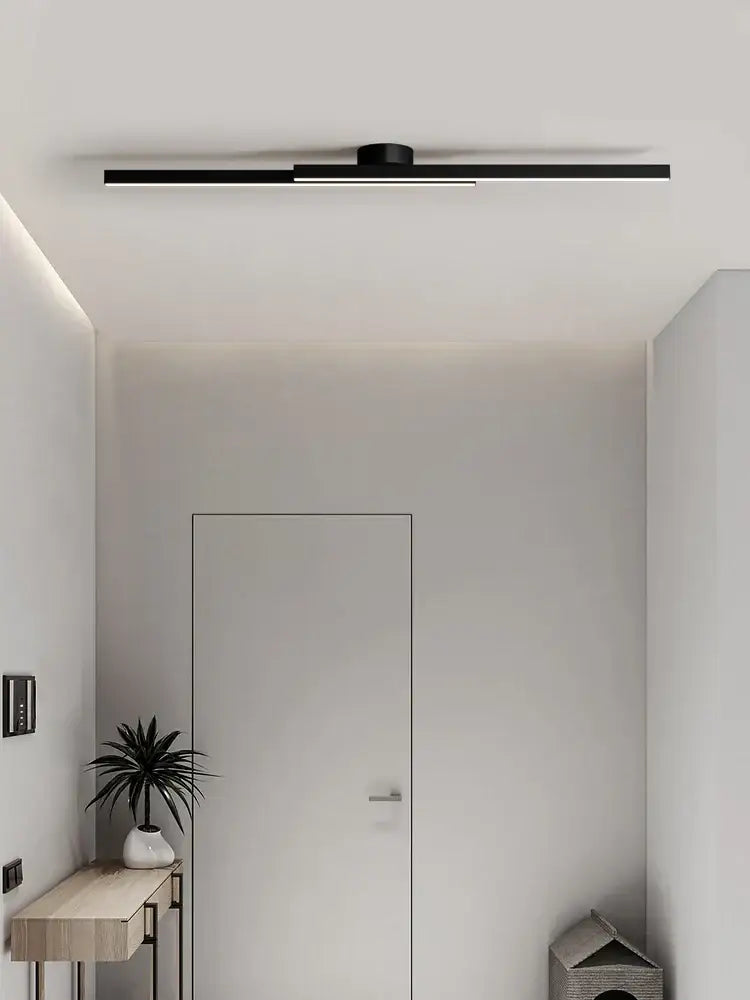 Modern black linear nordic ceiling lamp with sleek design suitable as a ceiling lamp for living room lighting