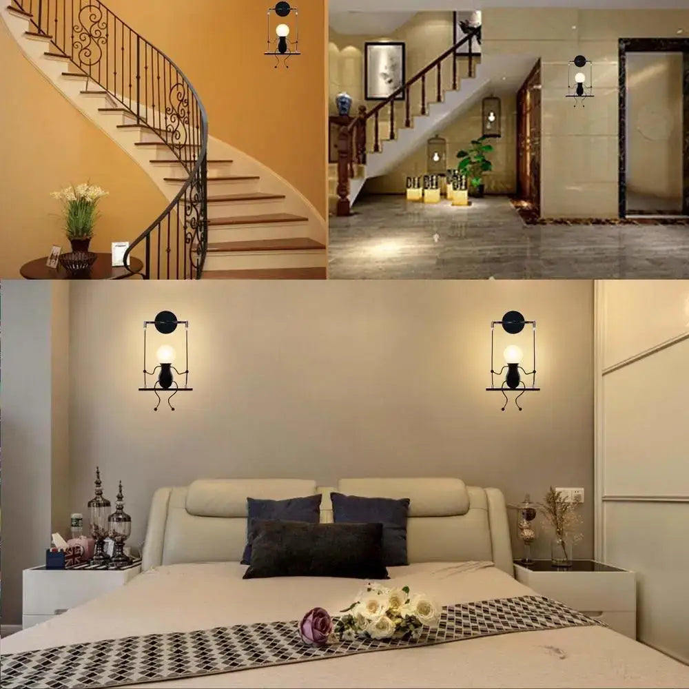 Modern black little man led wall light featuring minimalist wrought iron design with circular tops and hanging bulbs
