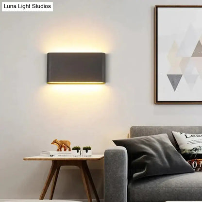 Modern black luna outdoor wall light with sleek dark gray finish and warm led ambient lighting for patio use