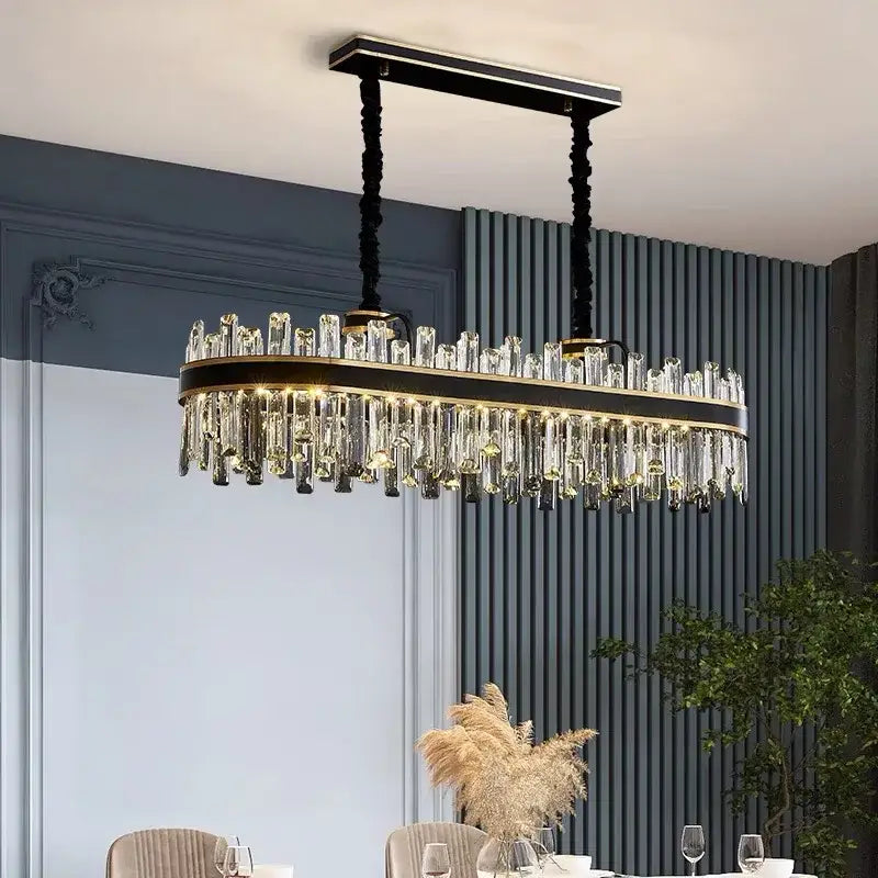 Elegant black and gold oval luxury crystal chandelier with cascading clear prisms for dining room decorbites light luxury