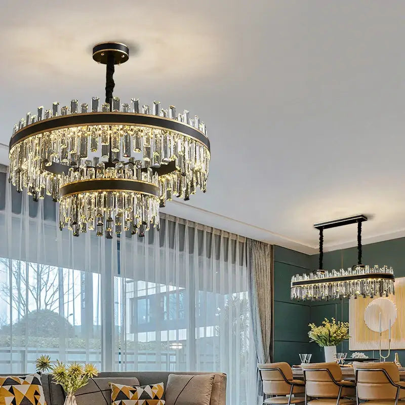 A modern black luxury crystal chandelier with two-tiered metal frame and cascading prisms for dining room decorbites light luxury