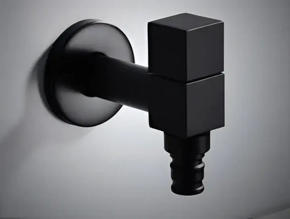 Modern black matte bathroom corner faucet with geometric cube design and wall-mounted base for copper bathroom corner use