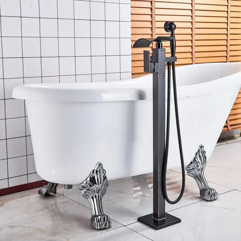 Modern black matte waterfall bathtub mixer faucet with sleek design and attached handheld showerhead for versatile use