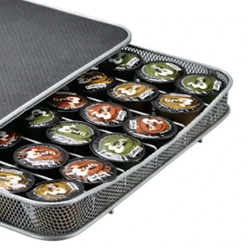 Modern black mesh capsule holder with a silver mesh body and black textured lid holding colorful k cups by decorbites capsule holder