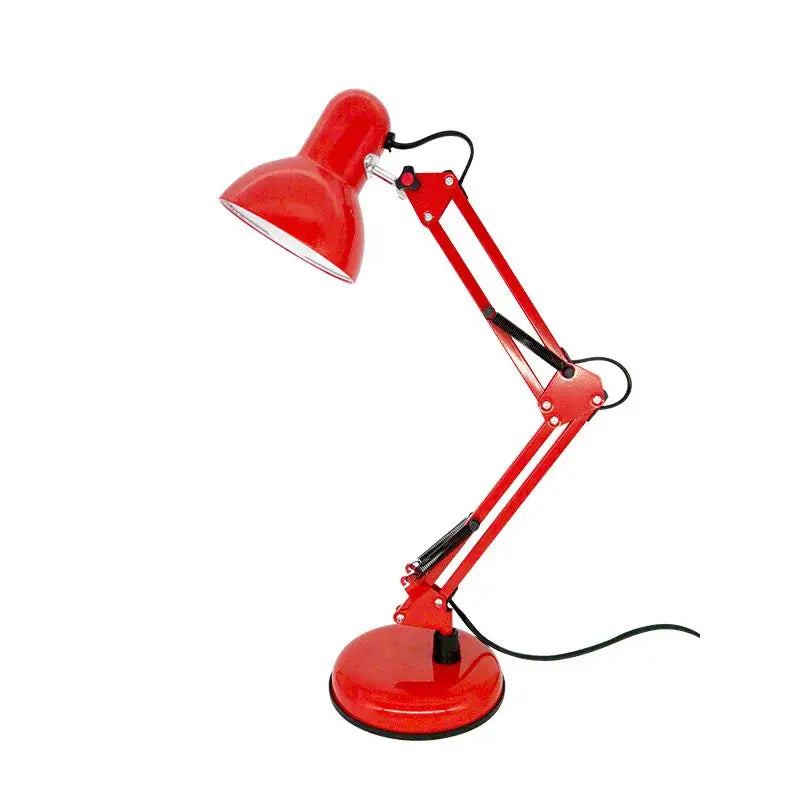 Red metal desk lamp with adjustable swing arm and circular base for modern bedroom or office use