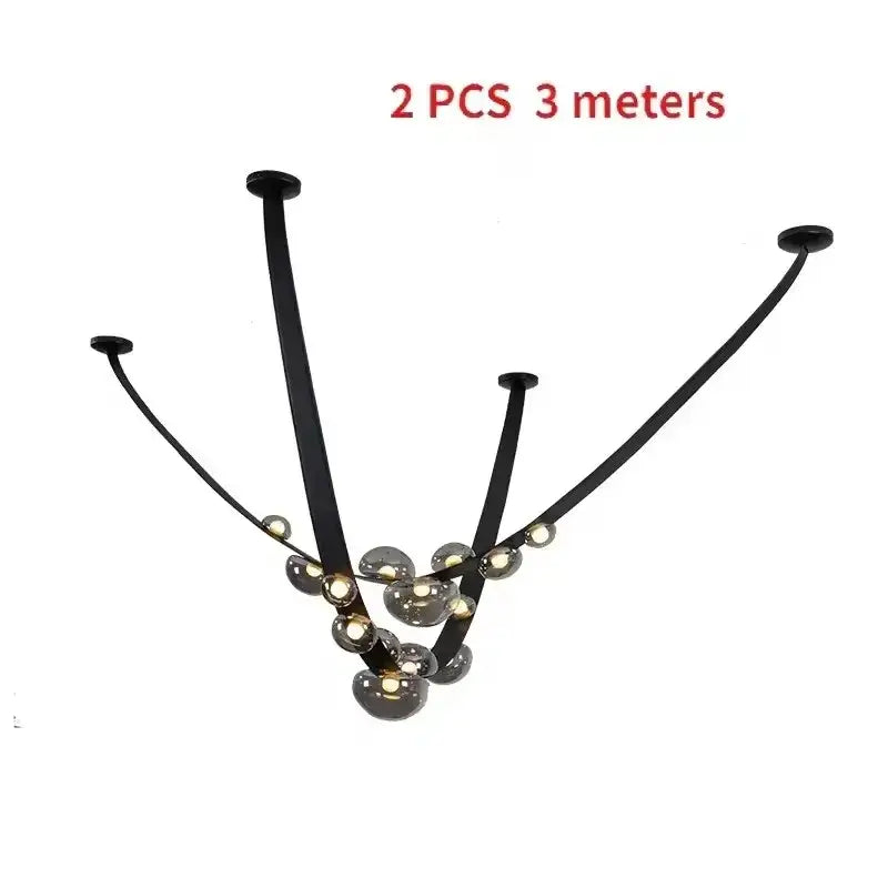 Modern black metal chandelier pendant light with curved arms and globe glass bulbs for designer leather loft decorbites decor