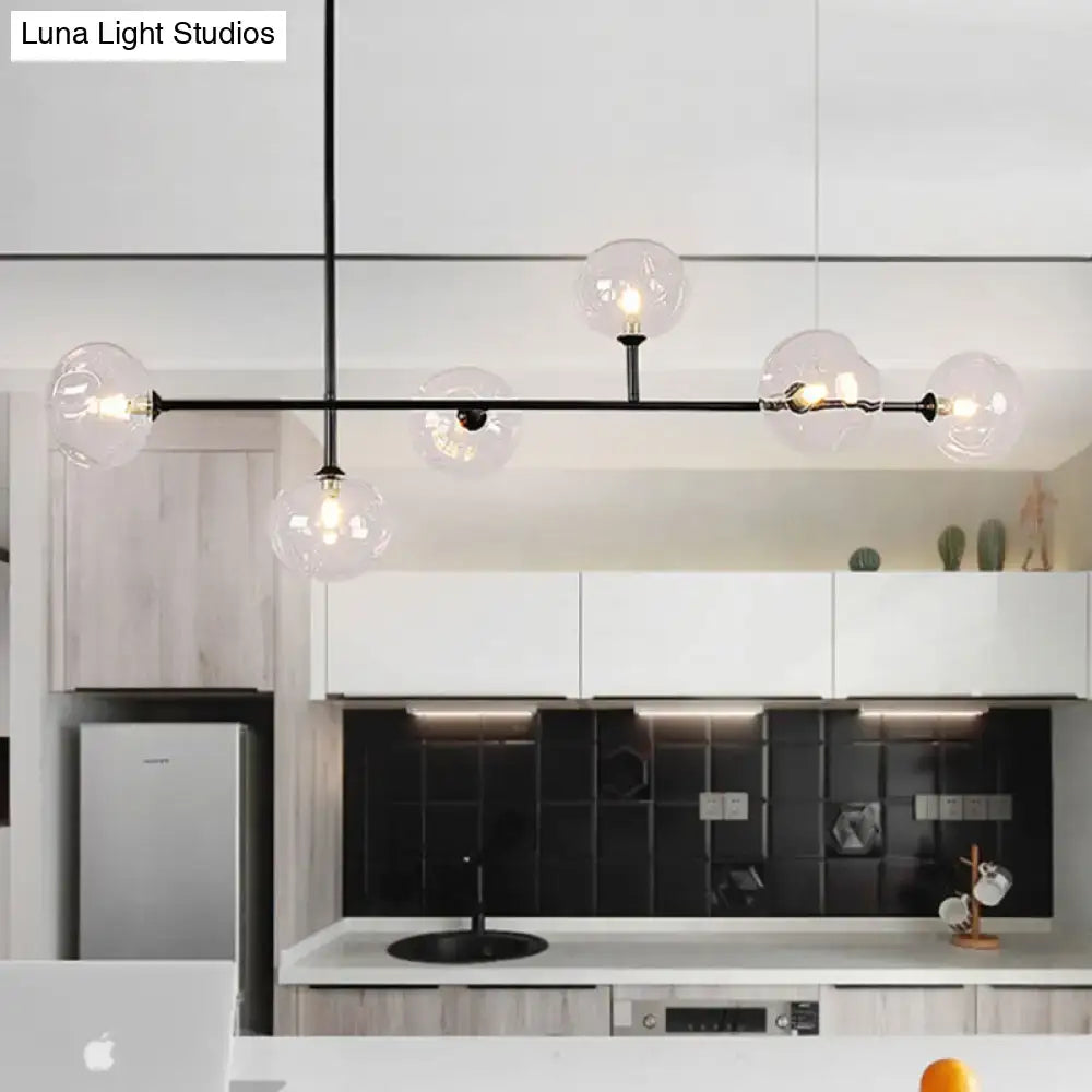 Modern black metal chandelier with clear glass globe bulbs and bulb base for stylish restaurant ambiance lighting