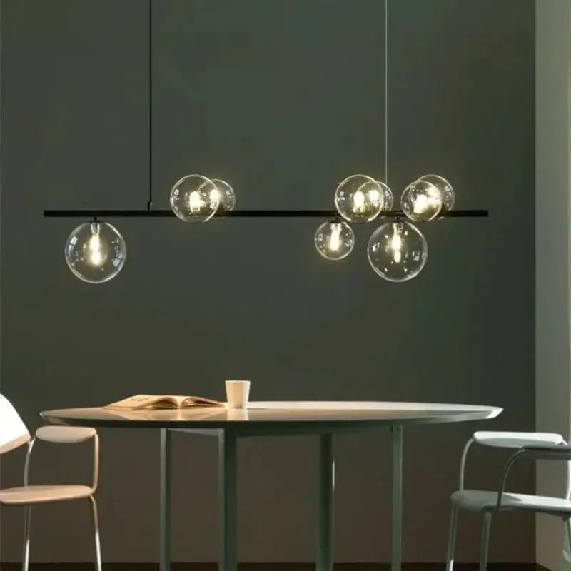 Modern black metal clear glass led chandelier with globe bulbs designed for dining room decorbites clear glass lighting