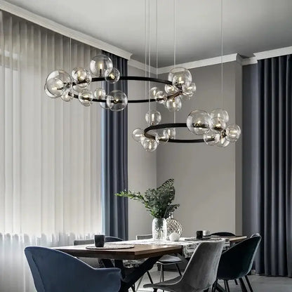 Modern black metal clear glass led chandelier with globe bulbs arranged in concentric circles for dining room decorbites clear glass