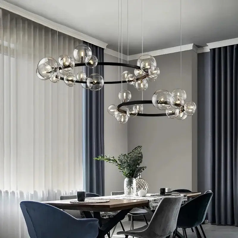 Modern black metal clear glass led chandelier with globe bulbs arranged in concentric circles for dining room decorbites clear glass