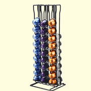 Modern black metal capsule holder stand with vertical slots holding colorful blue purple gold and silver coffee pods