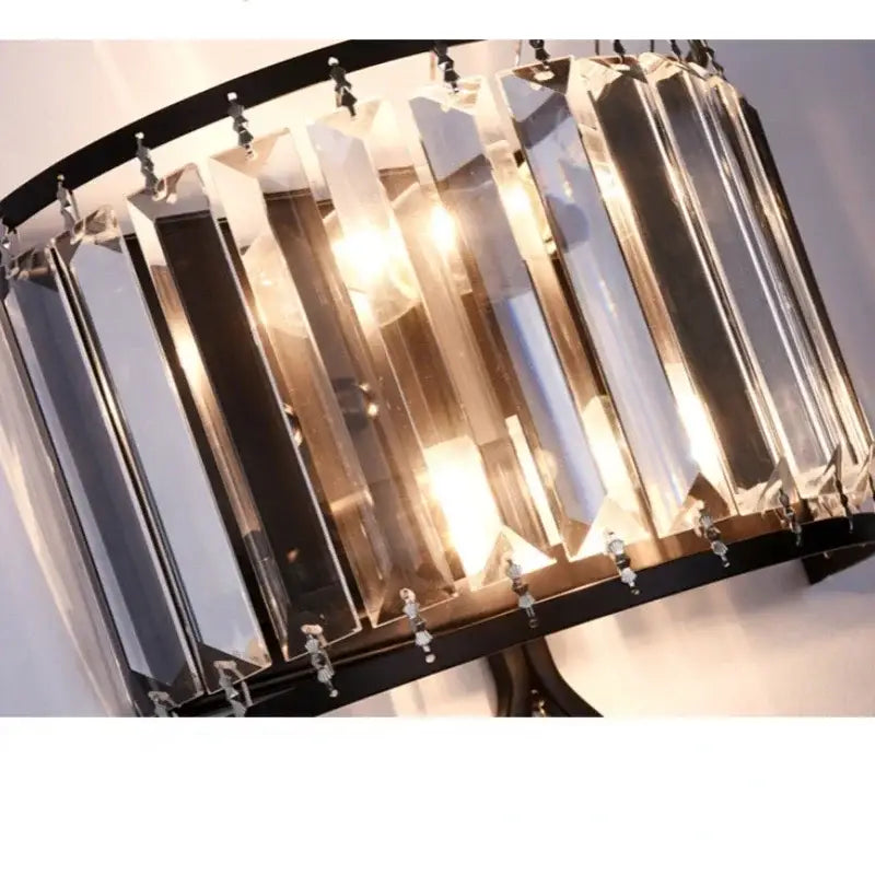 Modern black metal led wall lamp with vertical faceted crystal prisms for elegant living room lighting