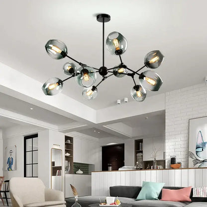 Modern black metal decorbites glass chandelier with multiple frosted globe shades for dining room lighting
