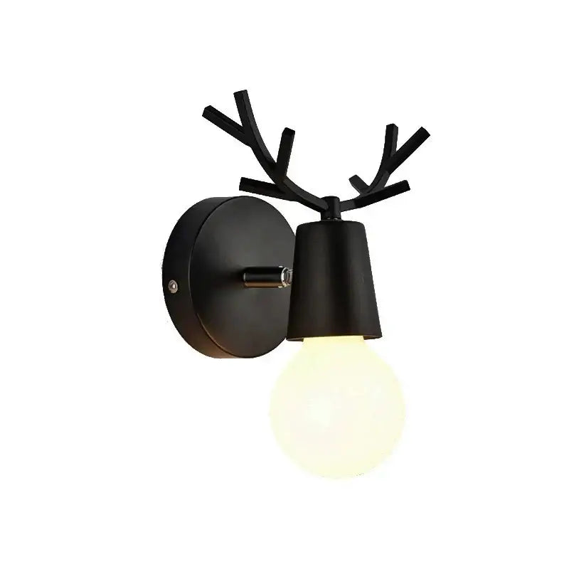 Modern black metal deer head led wall lamp featuring antlers and a frosted bulb for bedroom sconce use