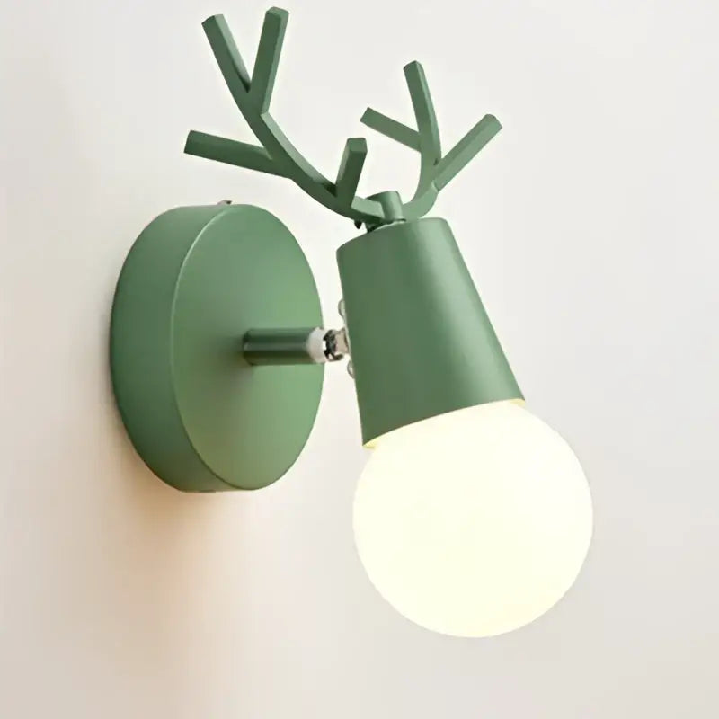 Modern black metal green deer head led wall lamp with antler design and frosted bulb for bedroom sconce lighting