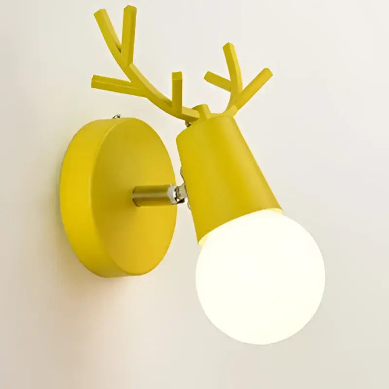 Modern yellow deer head led wall lamp with antler design and round bulb made of black metal for bedroom sconce use