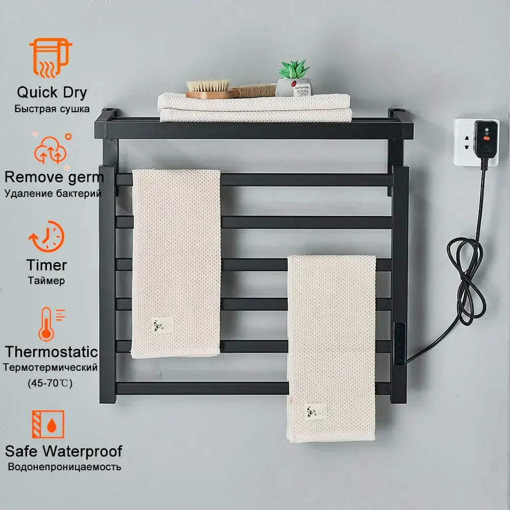 Modern black metal electric towel rack with multiple horizontal bars and digital display plugged into power outlet