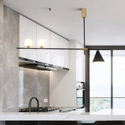 Modern black metal island lamp with opal glass shade featuring two spherical frosted bulbs and gold-toned fixtures