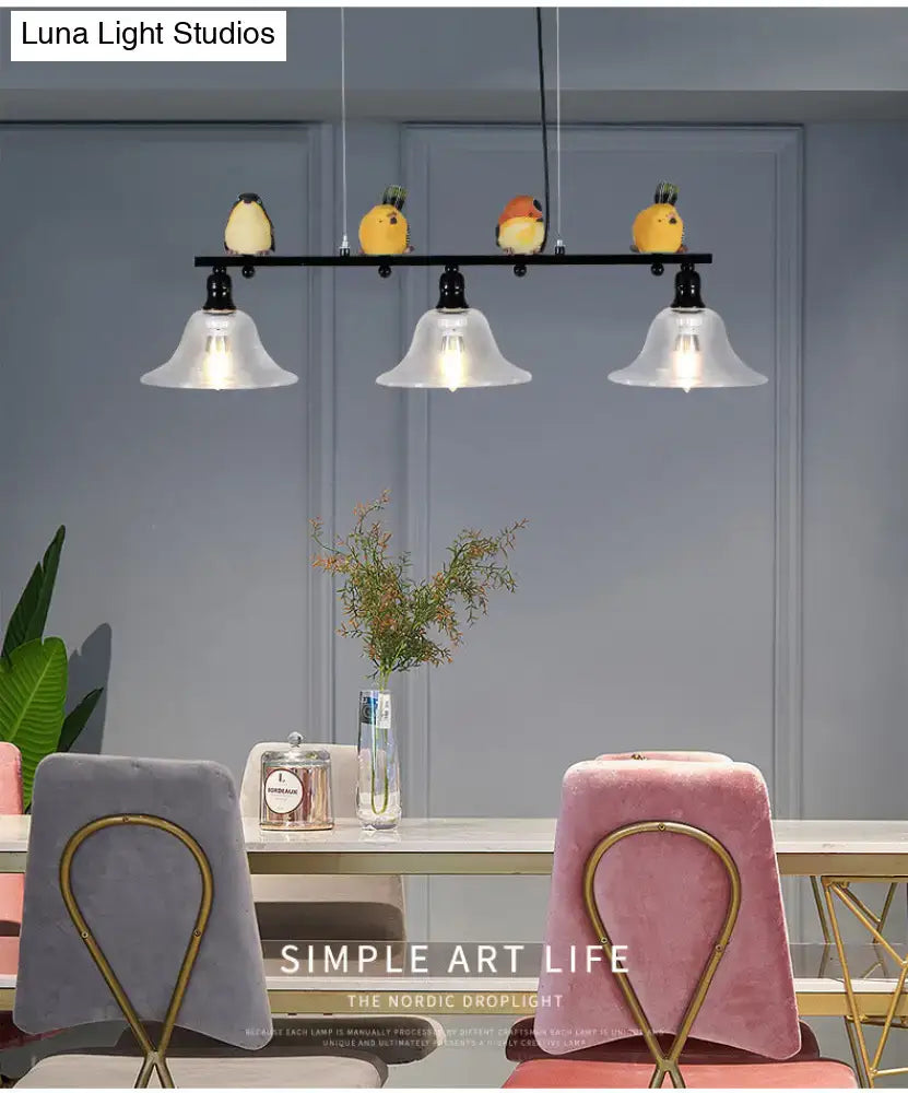 Modern black metal island pendant light with four frosted glass shades and yellow bird figurines 110v-120v