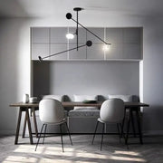 Modern black metal led chandelier with spherical light fixtures designed for living room decorbites black metal style