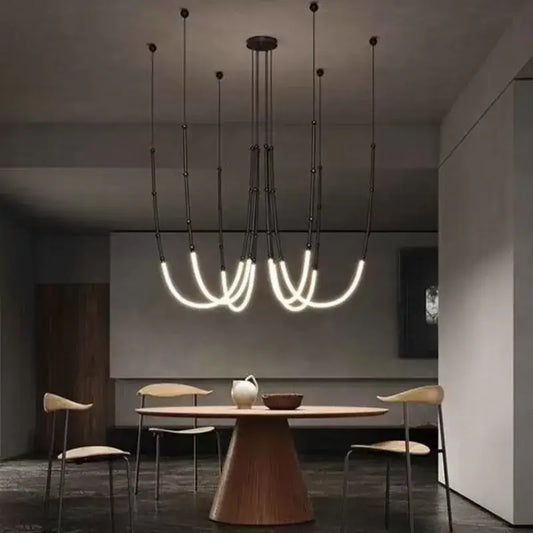 Modern black metal pendant lights with curved glowing white led strands perfect for living room decorbites bamboo pendant designs