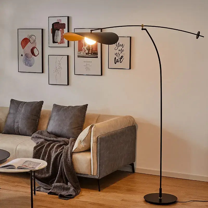 Modern black metal floor lamp with long arm and dual-toned matte leaf shade perfect for decorbites adjustable long use
