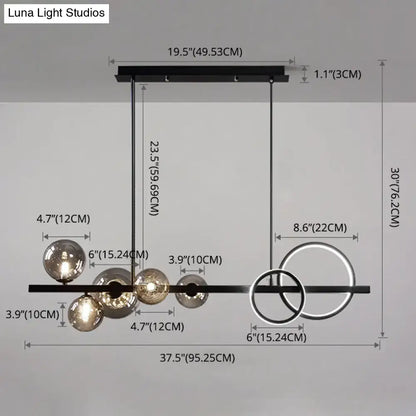 Modern black metal pendant light fixture with spherical glass globes and circular ring accents for dining room ceiling light